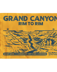 Navy blue summit flag with Grand Canyon Rim to Rim trail illustration and white text on a yellow background.