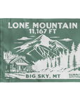 A green summit flag depicting the classic  dramatic view of Lone Mountain and with Lone Mountain and elevation of in white text the name of Lone Mountain and the 11,167 elevation written in white text at the top and Big Sky, MT written at the bottom.